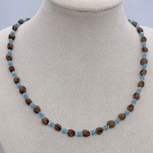Vintage handmade necklace made of seeds